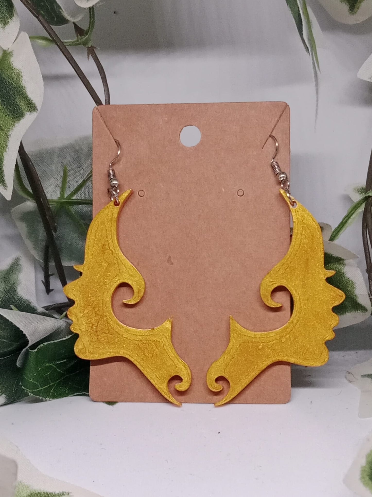 Boucle d'oreilles visages